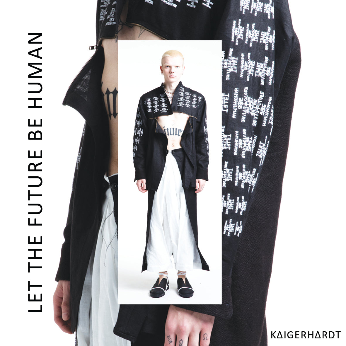 White man with blond hair wears a black shirt with white placed screen prints. It has two zipper at the chest and i half way open so you see a piece of the tattoo on his stomach. He also wears a black and white pair of 3/4 trousers in hakama style and black shoes with white shoelaces.